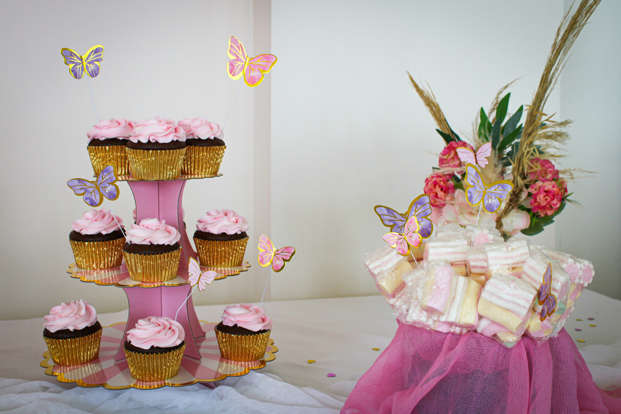 Pink cupcakes and marshmallows as a part of Christening decoration rentals in Cyprus