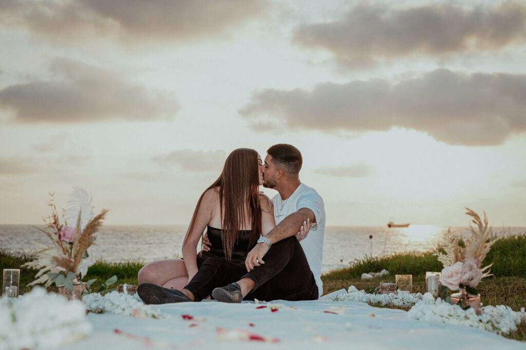 engaged couple sunset Cyprus surprise private marriage proposal engagement