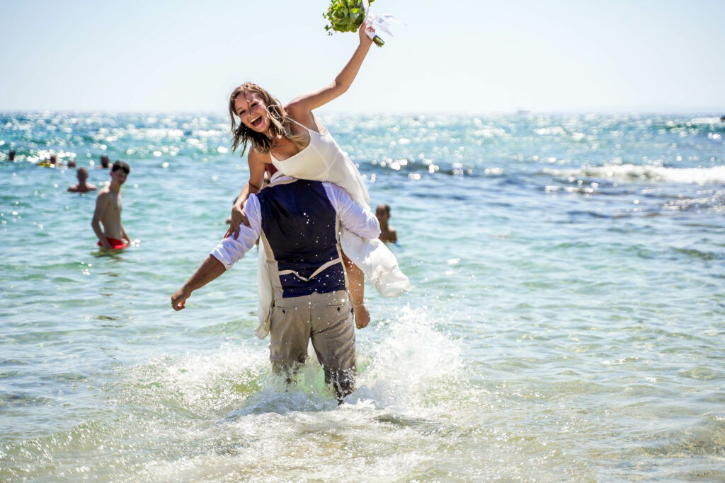 Ammos Kampouri Ayia Napa beach wedding funny marriage photoshoot Cyprus Protatas bride and groom in the sea private package