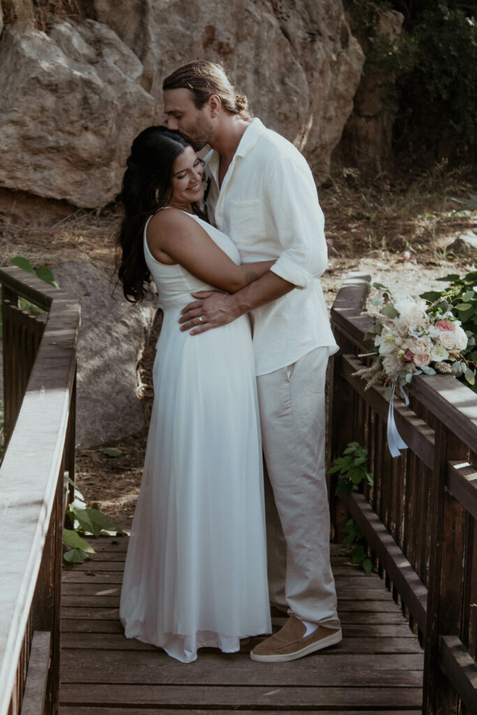 married couple on a love bridge private wedding ceremony Lemba Vrisi Paphos Cyprus