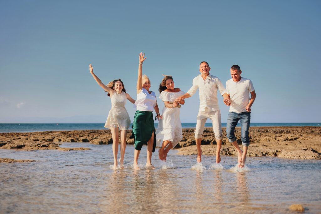 happy family wedding photoshoot Cyprus beach ceremony