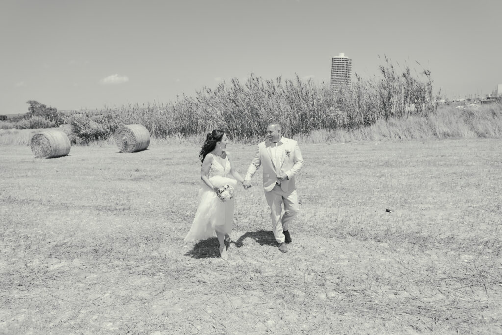black and white romantic wedding photoshoot in fields funny Cyprus