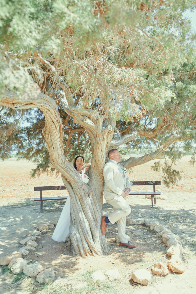 bride and groom romantic photoshoot at Tree of Lovers near famous Sea Caves in Ayia Napa Cyprus