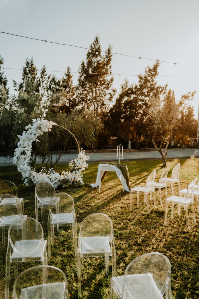 wedding ceremony white floral round arch and crystal chivari chairs hire and rental services Ayia Napa and Paphos Cyprus