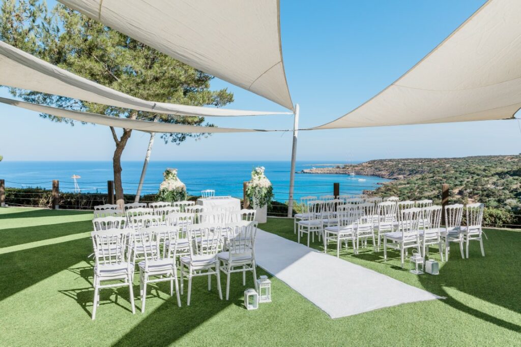 Panoramic view on Konnos bay in Cyprus with a bautiful wedding ceremony set up at Grecian Park hotel