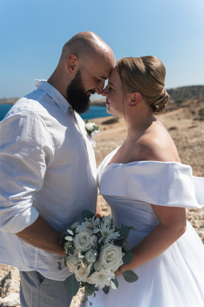74208041-Edit_www.happyimagescyprus.com bride and groom during their wedding photoshoot at Coralli Blue Lagoon