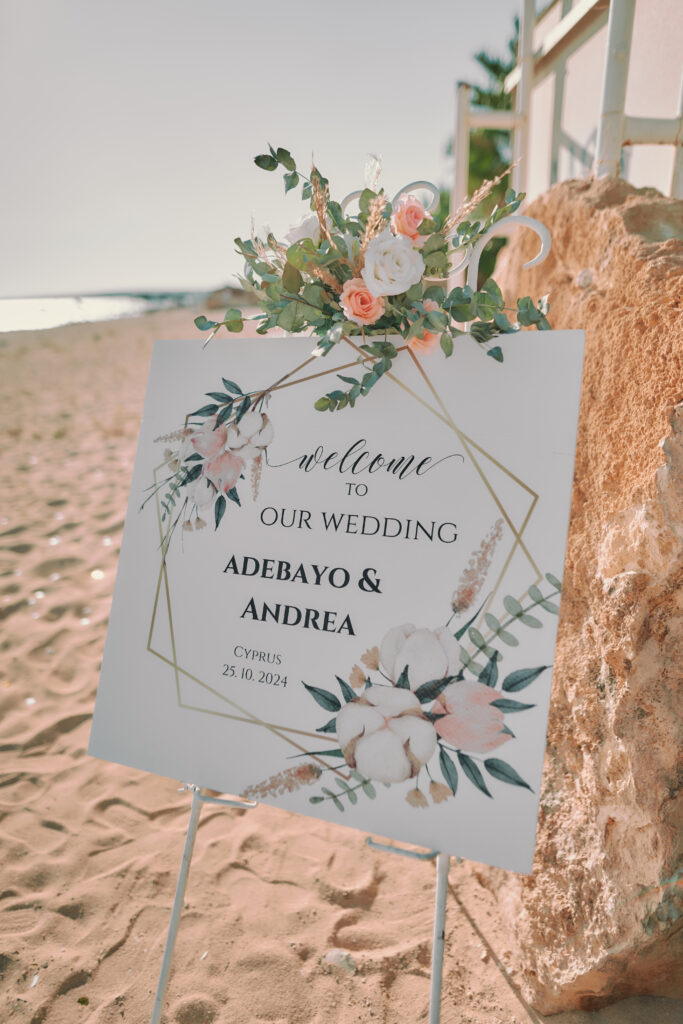 custom made wedding welcome sign placed on a white stand as a part of wedding decoration rental in Cyprus