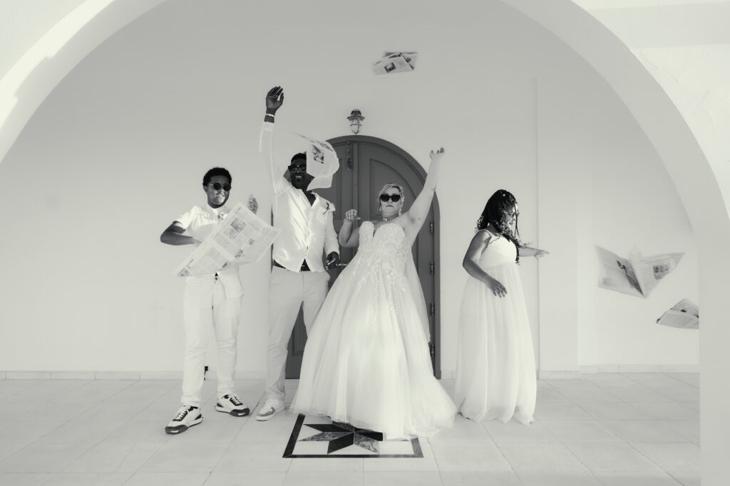 funny black and white family wedding photoshoot in Cyprus