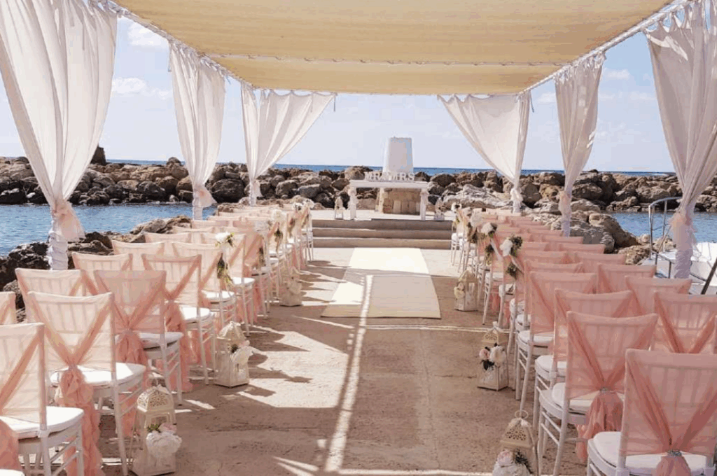 wedding ceremony decorations at the pier of Corali Beach hotel resort in Paphos Cyprus