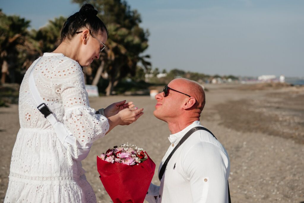 freshly engaged couple sharing romantic moment during their romantic proposal in Cyprus