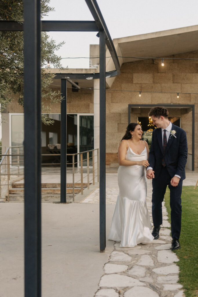 bride and groom entering their dinner party at Dafermou vinery in Cyprus