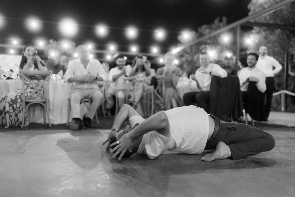 traditional Cypriot dancers entertaining wedding party at rustic venue in Cyprus