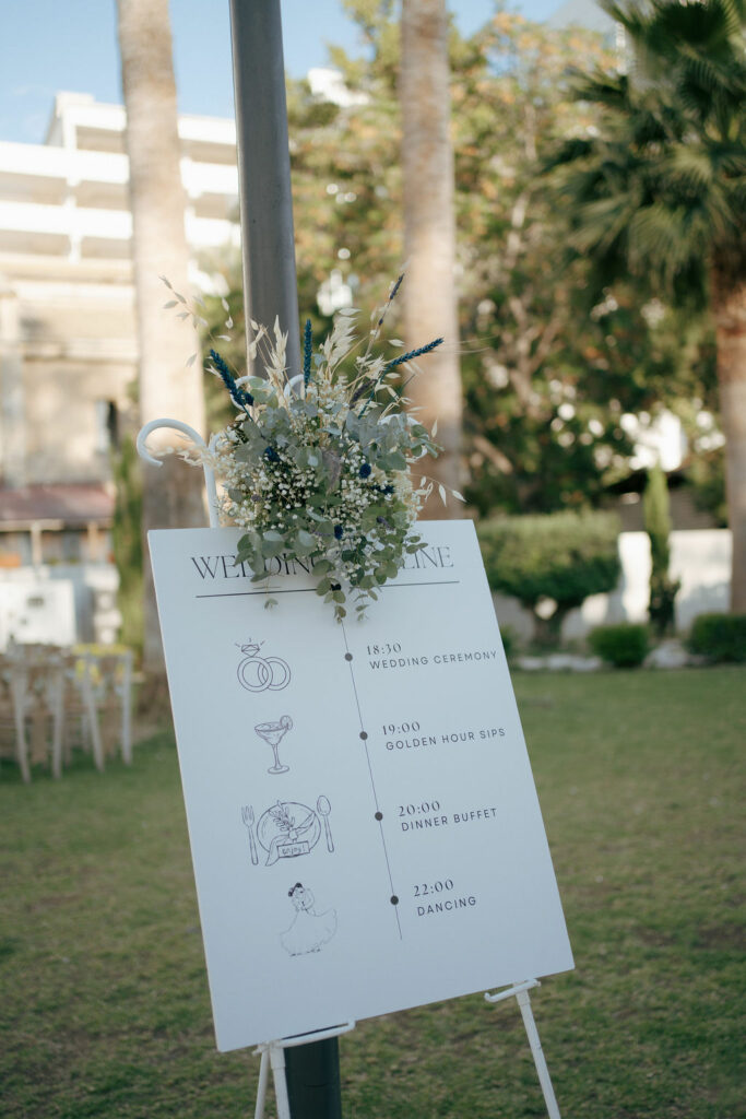 wedding timeline board at the wedding in Larnaca
