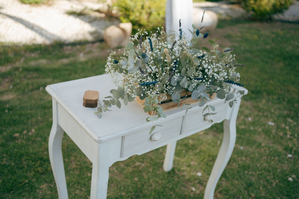 rustic white wedding ceremony table as a part of wedding decoration rentals in Larnaca Cyprus