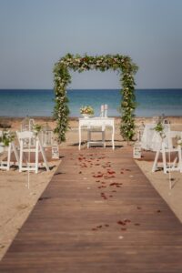 fresh flower beach ceremony arch at the Ayia Triada beach venue in Cyprus