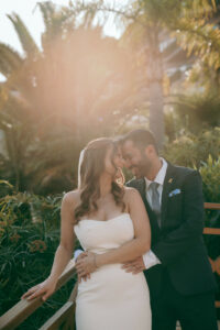 romantic sunset wedding photoshoot of bride and groom in the gardens of Four Seasons hotel in Limassol