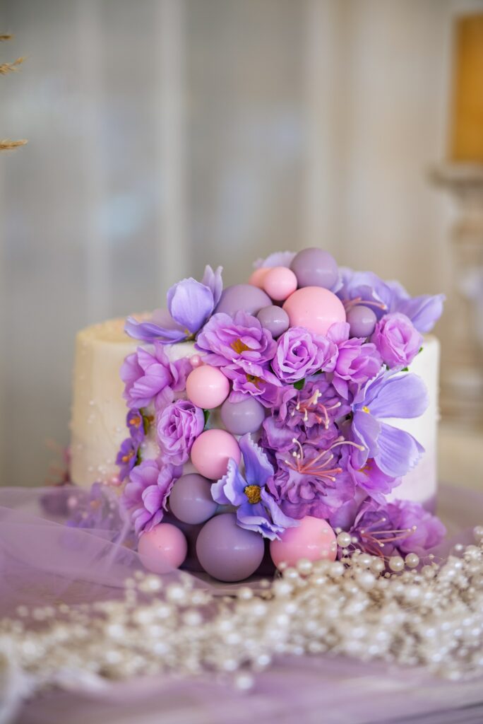 custom made cake Purple baptism cake with custom decor and flowers