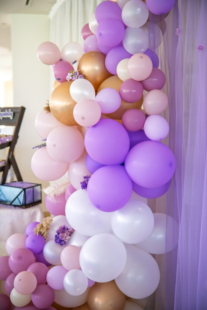 Purple themed Christening balloon arch decorations