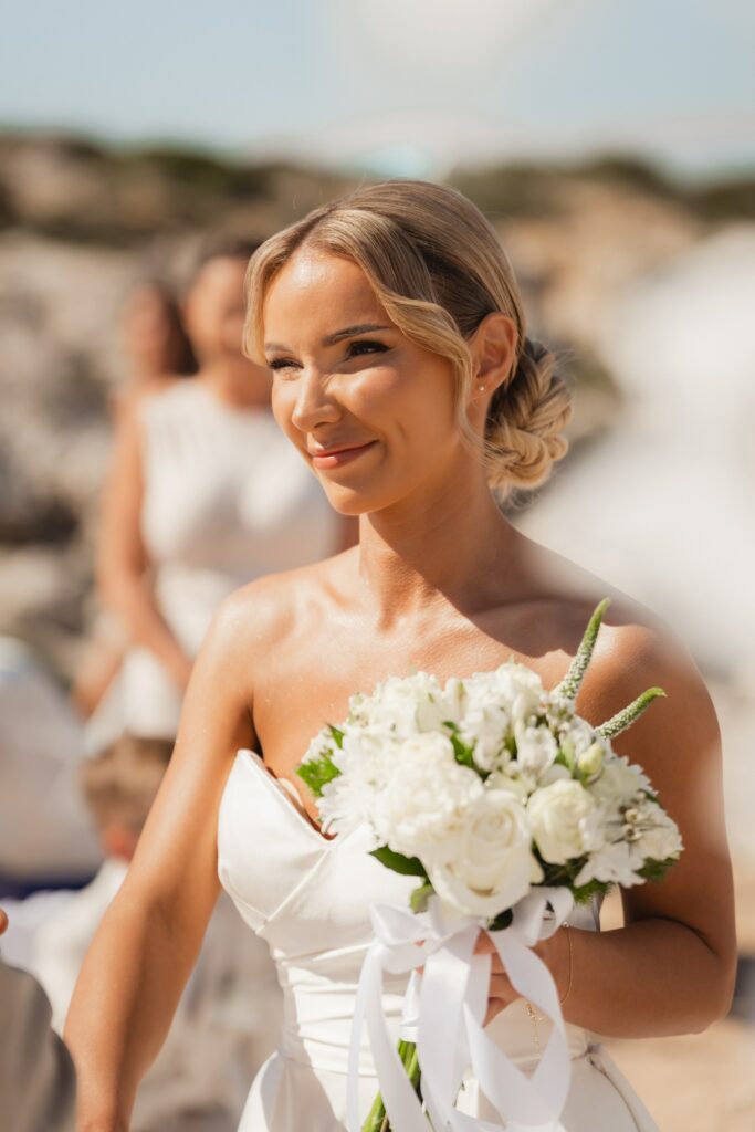 bridal bouquet beautiful bride holding her white floral bouquet during her wedding ceremony in Cyprus