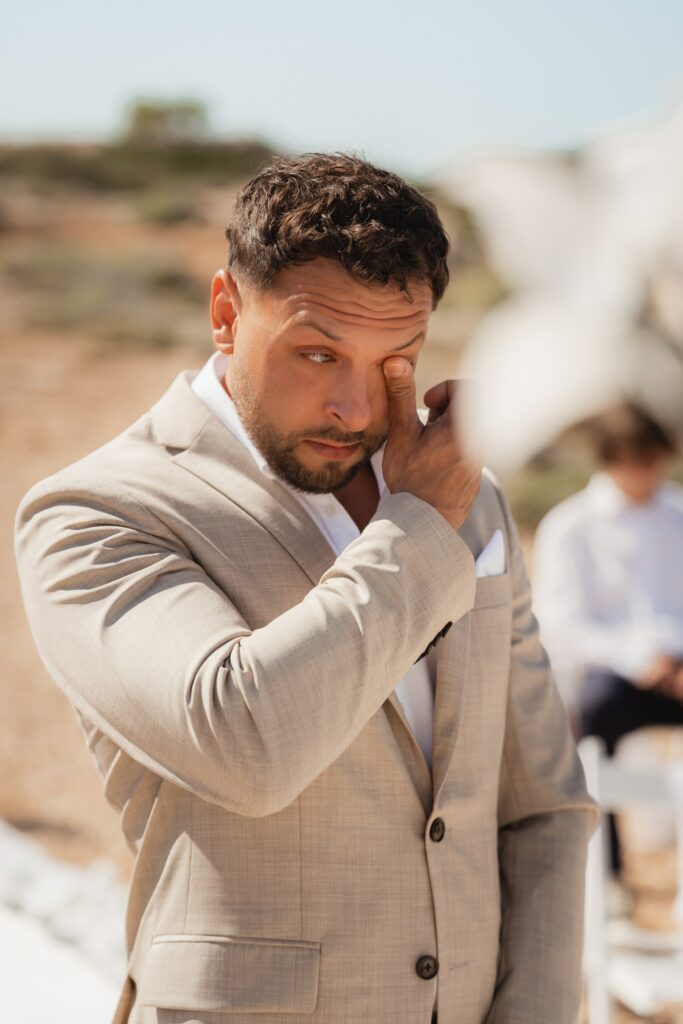 beach wedding photos in Cyprus Groom crying during the wedding ceremony in Cyprus